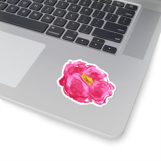 Laptop with a pink floral sticker on the palm rest area