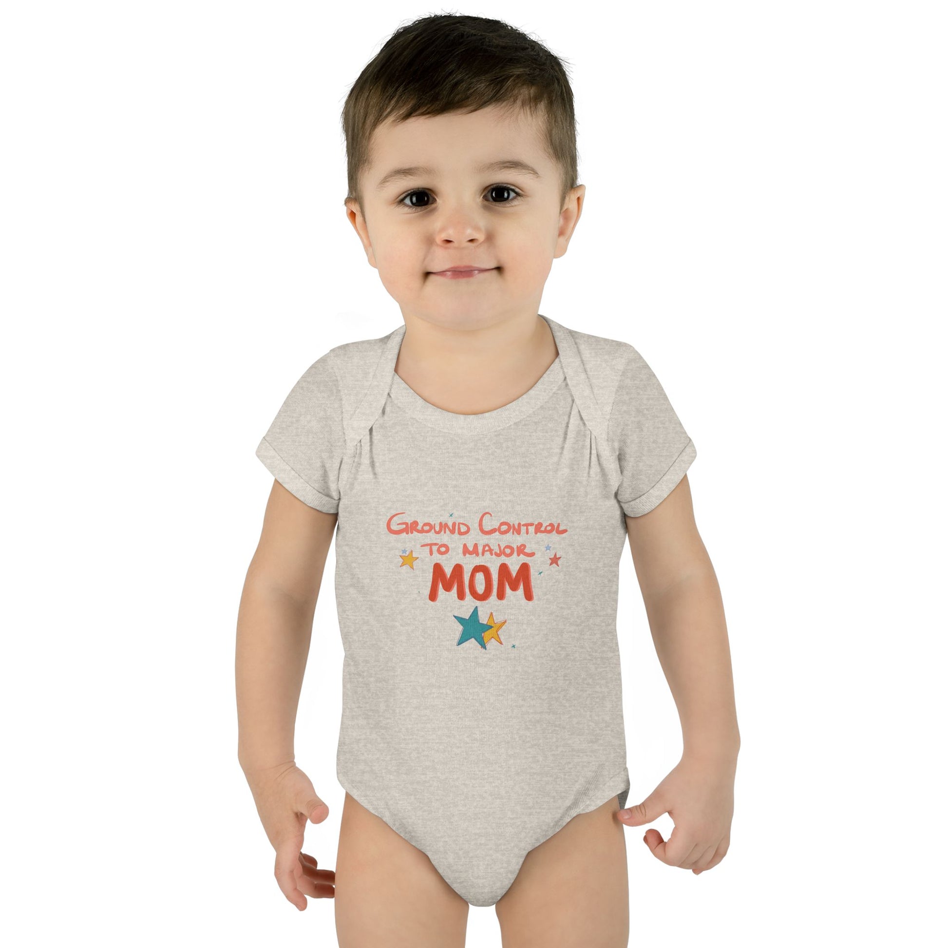 Child wearing a grey baby onesie with 'Ground Control to Major Mom' text on a white background