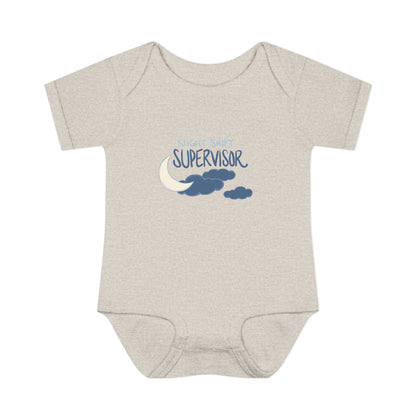 Grey baby onesie with 'Night Shift Supervisor' text and moon/cloud design on a white background
