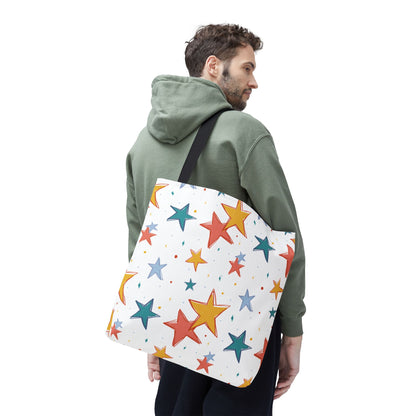 Man carrying a tote bag with colorful star pattern on a white background
